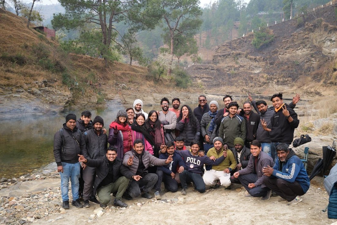 The full film crew gathered on a Kumaon riverbank after the final shot.